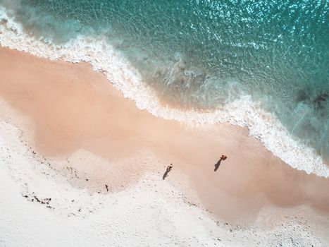 Beach shoreline curved patterns shapes and colours of the tide 
