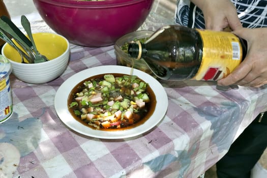 adding kvass to okroshka, Russian cold vegetable soup