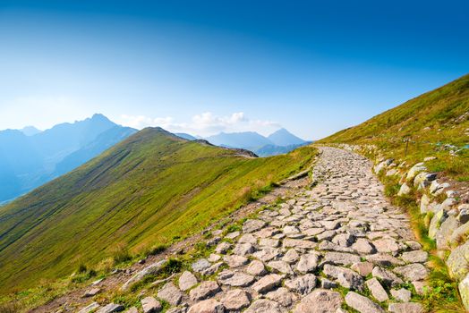 trail at the top of the mountain Kasprowy Up in Poland on a sunny day