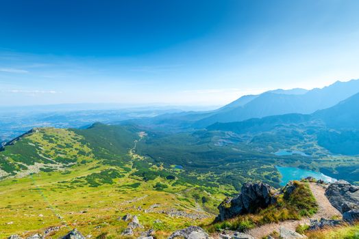 a picturesque green valley with lakes in the Tatra Mountains, Poland. View from Kasprowy Wierch