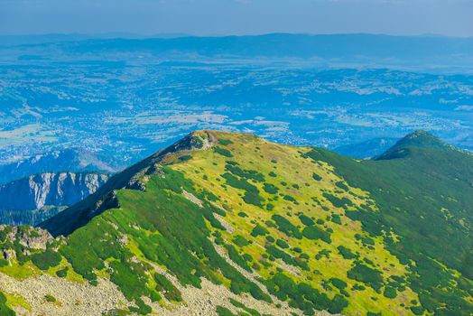 The view from the highest mountain in the town in the valley, the mountain Kasprowy Wierch in Poland