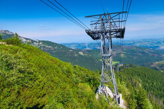 Metal support for the funicular on the background of beautiful mountains in Zakopane, Poland