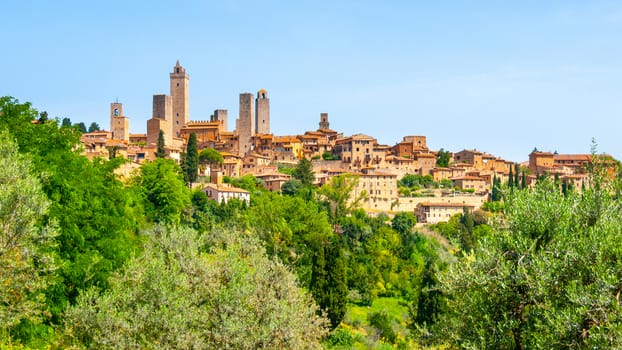 San Gimignano - medieval town with many stone towers, Tuscany, Italy. Panoramic view of cityscape.