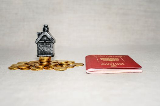 Passport, money and home - the concept of buying a property.