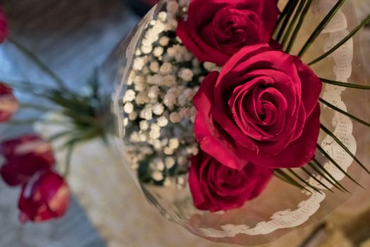 decorated with a bouquet of roses, top view