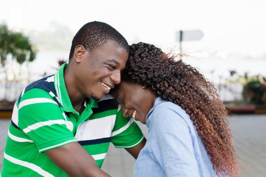 The happy young couple embracing , communicates perfectly