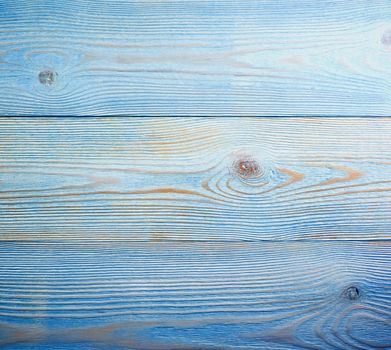 Stain Knot Blue and Beige Wooden Background closeup 