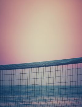 Retro Filtered Beach Volleyball Net At Sunset With Copy Space