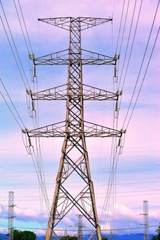 Electricity pylons at sunset