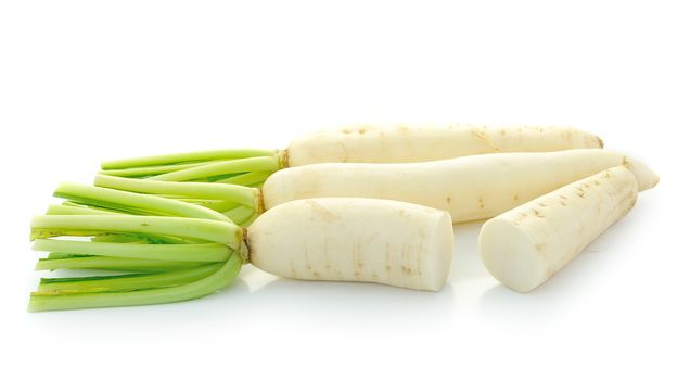 Daikon radishes isolated on white background