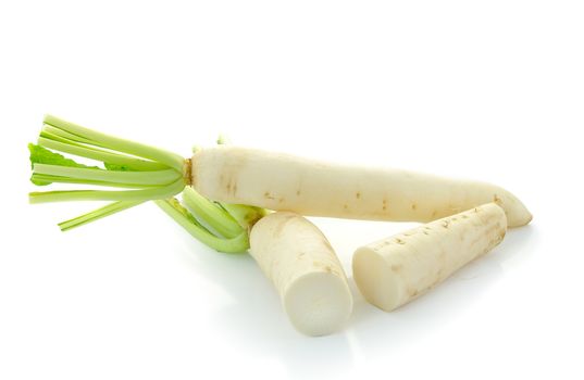 Daikon radishes isolated on white background