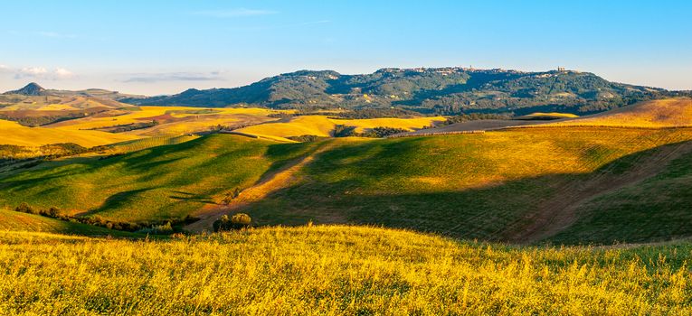 Panoramic view of Volterra and surronding Tuscan hilly landscape, Tuscany, Italia.