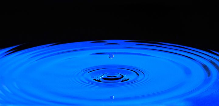 Drop of water in blue