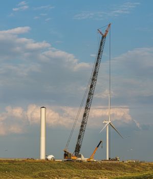 Rotterdam,Holland,16-July-2018:Building of new windmill in the europoort near Rotterdam , europoort is not near houses and they are building a windmill park there