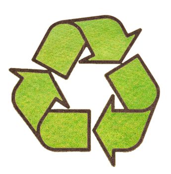 recycle sign from grass

