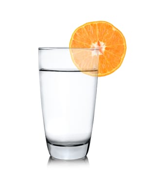 Glass of water with orange fruit