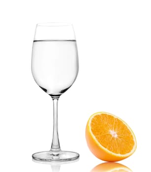 Glass of water and Half orange fruit on white background, fresh and juicy