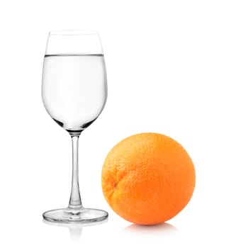 Glass of water and  orange fruit on white background