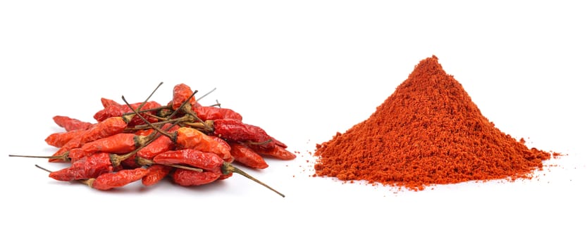 Powdered dried red pepper on white background