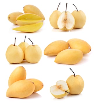 Ripe mango and pear on white background