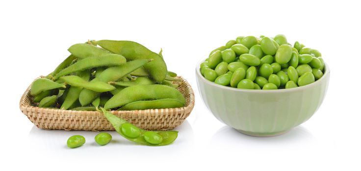green soybeans in the basket and bowl on white background