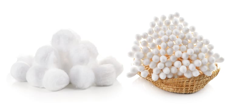 cotton bud and cotton wool in the basket on white background