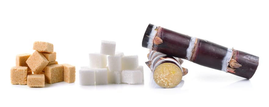 sugar cane and sugar cube on white background