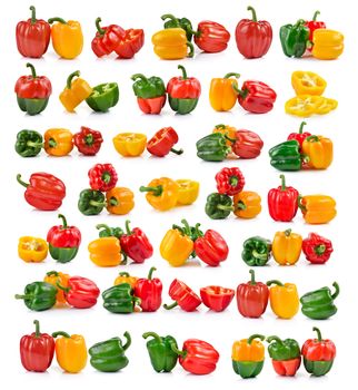 set of colored peppers over white background