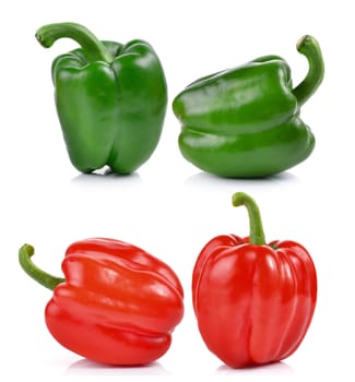 red and green pepper over white background