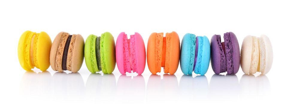 colourful french macaroons or macaron on white background