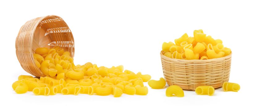 dry macaroni in the basket on white background