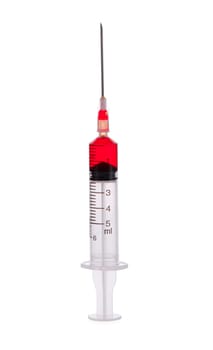  plastic syringe with red liquid isolated on white background