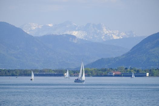 Landscape Chiemsee with boat in spring