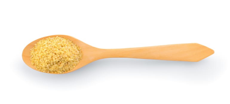 Wheat germ in wood spoon on white background