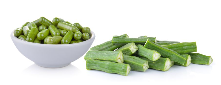 Moringa capsules in the bowl