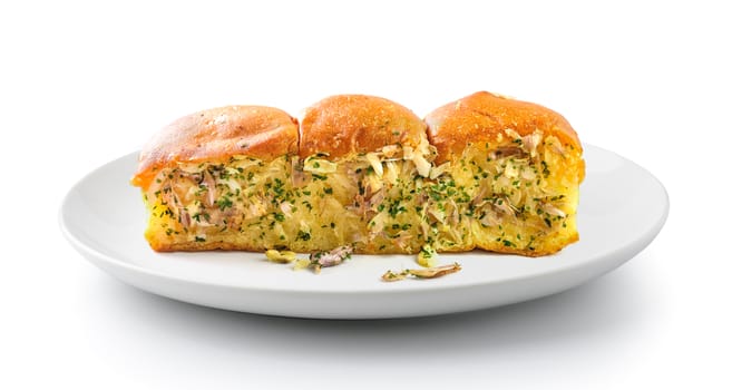 Garlic bread in plate isolated on a white background