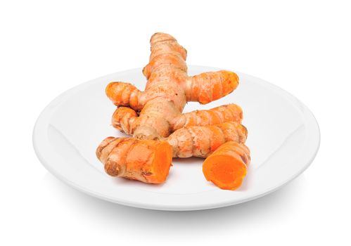 turmeric in plate on white background