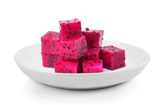 Dragon Fruit in plate on white background