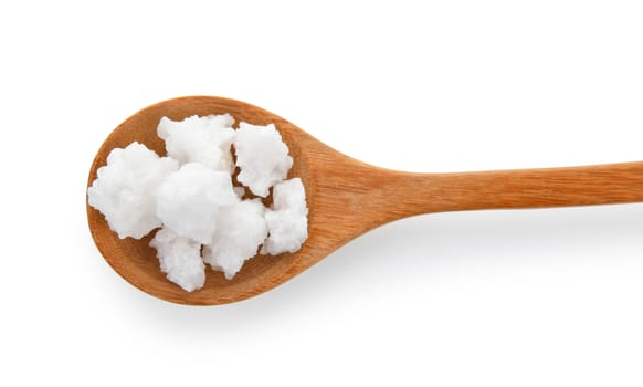 salt in wood spoon on white background