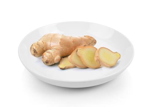 ginger in plate on white background