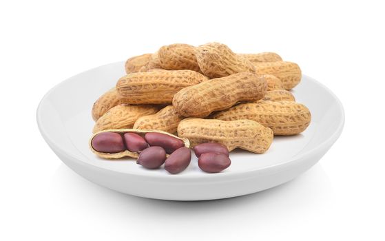 peanuts in plate on white background