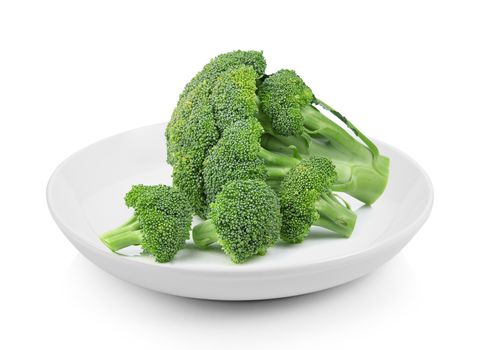 Broccoli in plate on white background