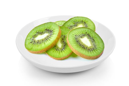 slices kiwi in  plate on white background