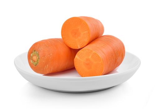 carrot in plate on white background