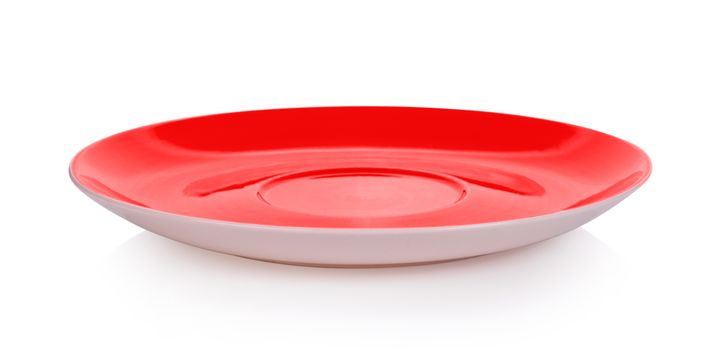 red ceramic plate on white background
