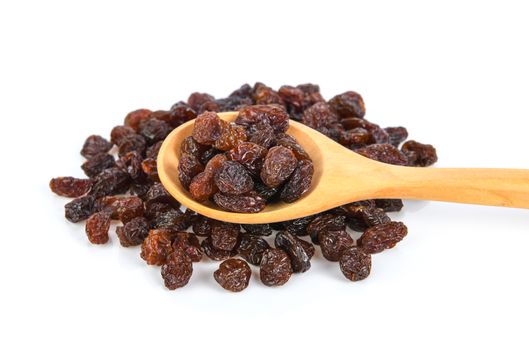 sweet raisin in wood spoon isolated on white background