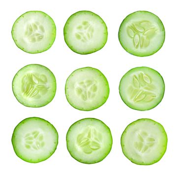Cucumber slices isolated on white background. Top view