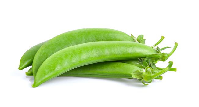 Green peas on white background