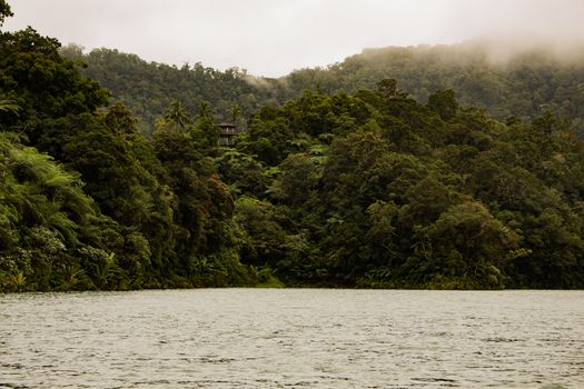 Two identical mountain lakes that are on top of the mountains on the island of Negros. Fog.