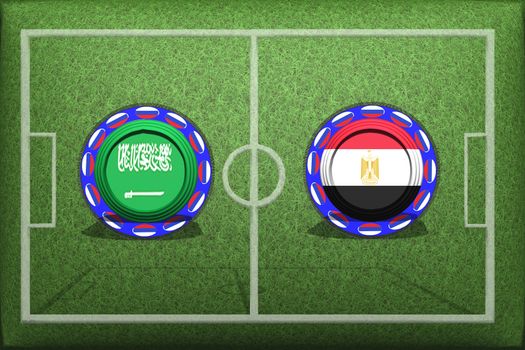 Football, World Cup 2018, game Group A, Saudi Arabia - Egypt, Monday, June 25, Button with national flags on the green grass.